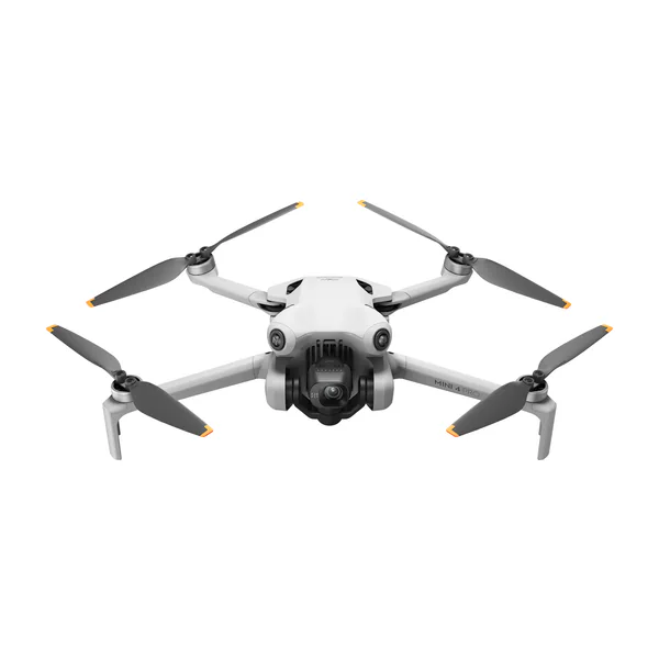 Drone DJI cinza com as hélices abertas